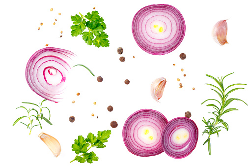Composition with red onion and spices isolated on white background. Top view.
