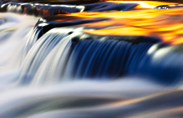istock Long exposure of waterfall in tungsten light 684559342