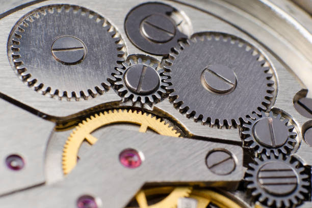 istock Metal gears of old clock mechanism 684564762