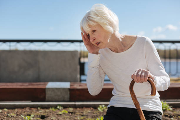 istock Distressed lady feeling headache in the park 684566426