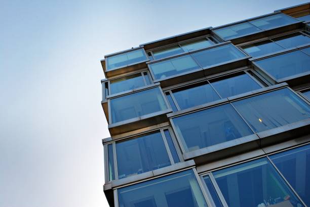 istock Modern office building with facade of glass. 684587336