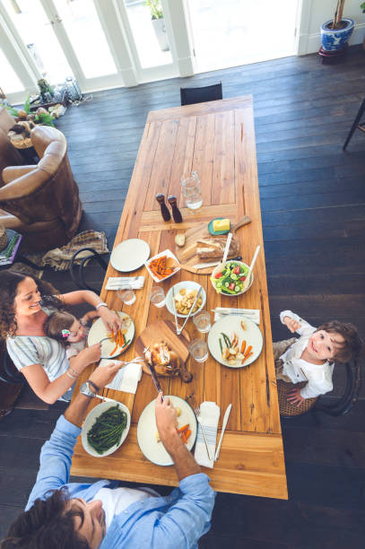 istock Family eating a meal at the table. 684595168