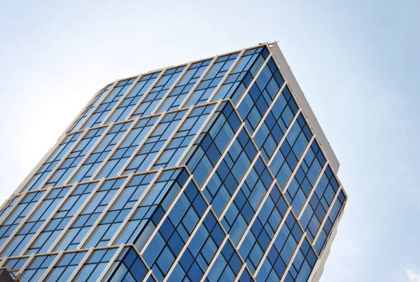 istock Modern office building with facade of glass. 684600418