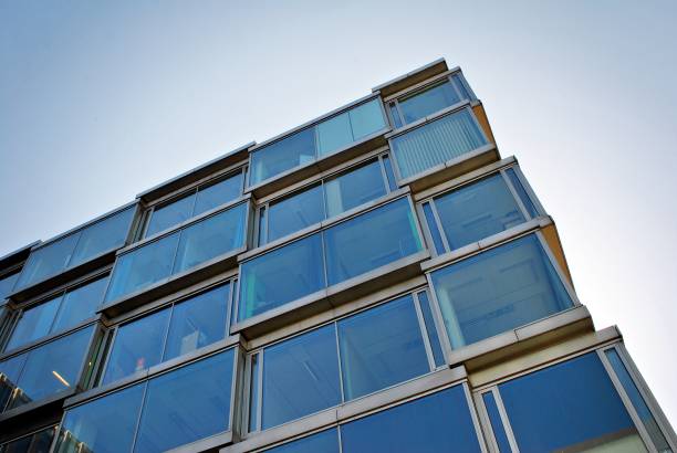 istock Modern office building with facade of glass. 684600458