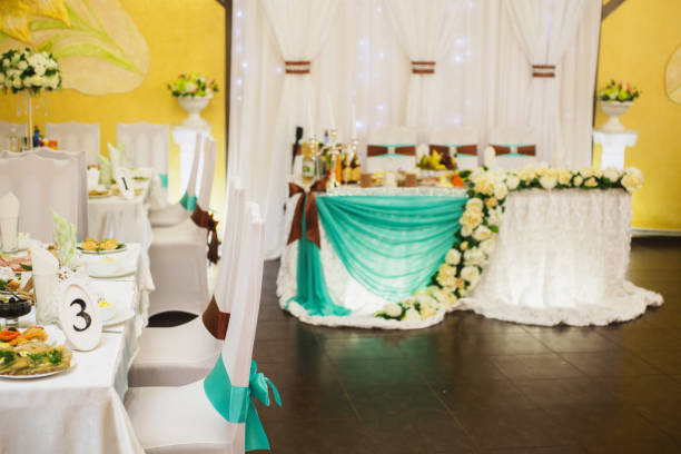 istock Decorated wedding table. Food on the table. Tableware. Empty glasses and wine glasses. Salad in a bowl. 684640210