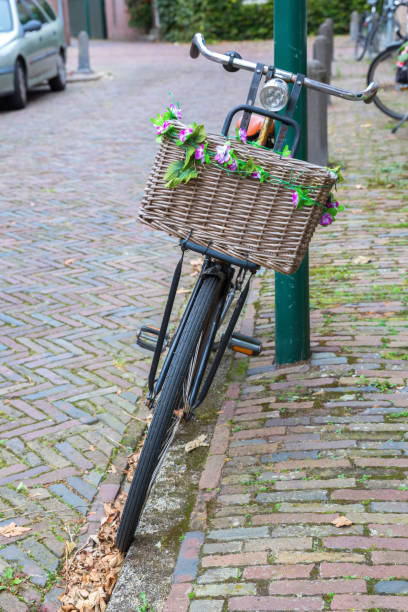 istock bicycle with a flower decorated shopping basket 684658944
