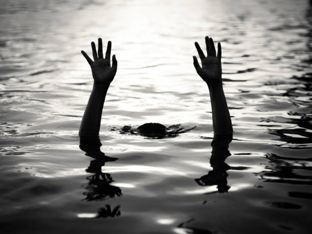 istock Drowning victims, Hand of drowning man needing help. Failure and rescue concept. 684673464