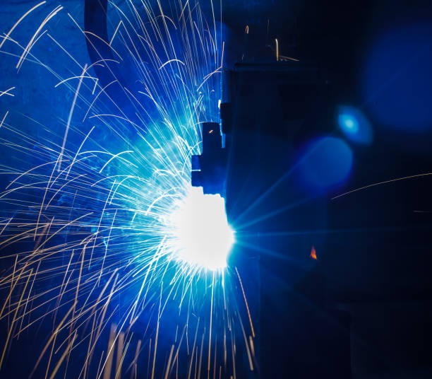 istock Welder robots movement in a car factory 684678202