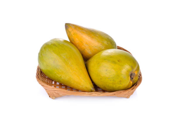 istock whole ripe Canistel or Egg fruit in bamboo basket and on white background 684680260