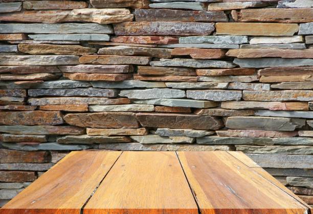 istock wooden shelves top empty and floor ceiling in stone wall background 684693454
