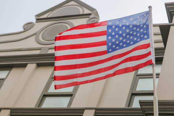 istock American flag on building 684698380