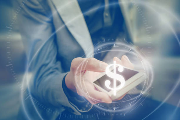 istock Businessman holding the phone virtual graph on the screen map point with dollar 684703852