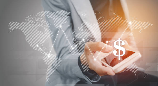 istock Businessman holding the phone virtual graph on the screen map point with dollar, blank copyspace area for text or slogan, against grey background 684703894