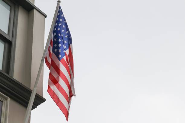 istock American flag on building, the  proudly displaying their 684706544