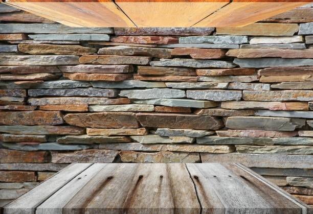 istock wooden shelves top empty and floor ceiling in stone wall background with reflect light for product display 684706758