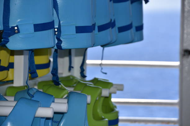 life jacket's sorted on the ship - motorboating sailing life jacket lake imagens e fotografias de stock