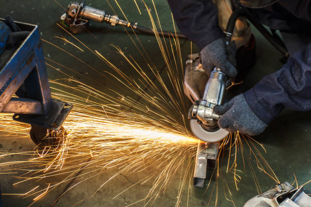 istock Metal in a factory grinding with sparks 684720616