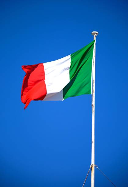 istock Italian flag against a blue sky. 684723464