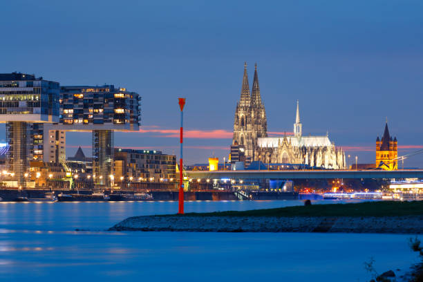 istock Cologne Cathedral and Rheinau Harbor (Rheinauhafen) at night 684737688