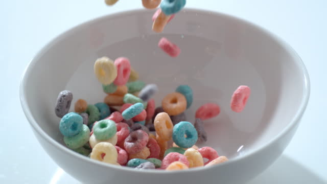 Cereal pouring into bowl in slow motion