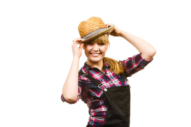 istock Woman wearing sun hat posing and smiling 684744140
