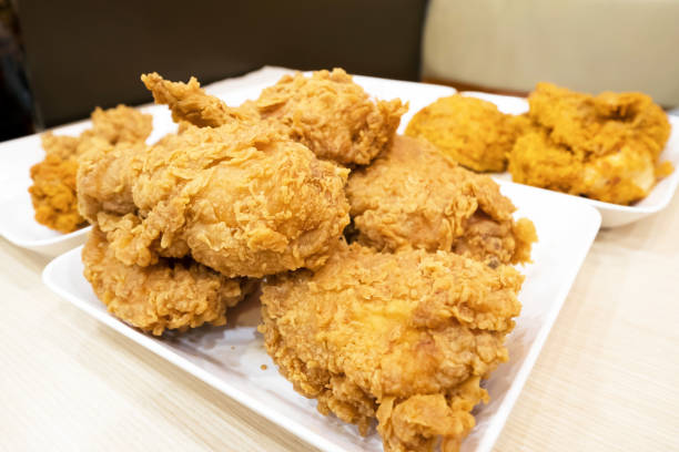 istock crispy kentucky fried chicken on a white plate and table. 684754420