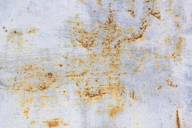 istock Rusted painted metal wall corrosion with streaks of rust 684761236