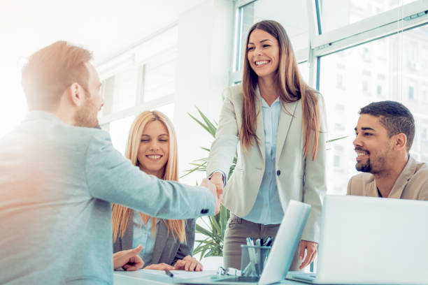 istock Business partners handshaking after signing contract 684763896
