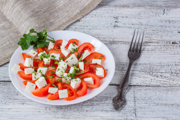 istock Fresh salad with tomato, mozzarella and herbs. 684764448