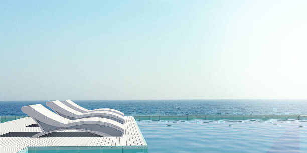 istock Pool terrace with sea view image,Beautiful view of Swimming Pool with the sea at sunlight - 3d rendering 684774458