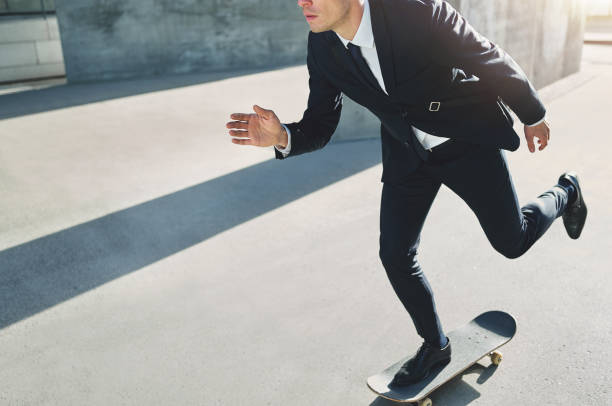 istock Businessman on a skateboard rushing to an assembly 684810556