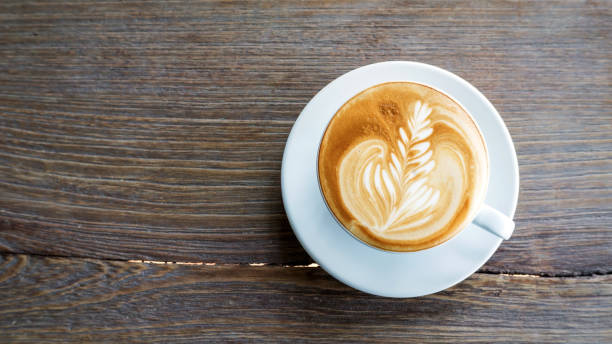 istock Hot coffee on a wooden table. 684816836