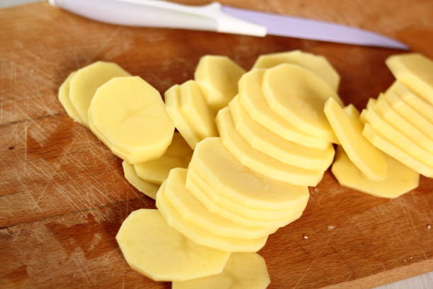 istock Raw potato circles. Making Potato and Leek Filo Pie. Series. 684817740