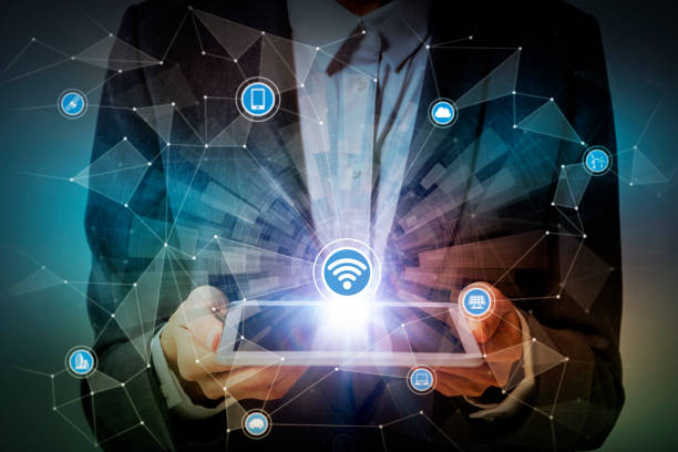 istock woman holding tablet device and internet of things concept, IoT(Internet of Things), ICT(Information Communication Technology), CPS(Cyber-Physical Systems), abstract 684820666