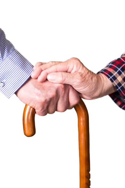 istock Senior couple holding hands on crutch 684823168