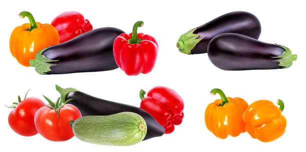 istock Fresh vegetable eggplants, tomatoes and red pepper isolated on white 684829546