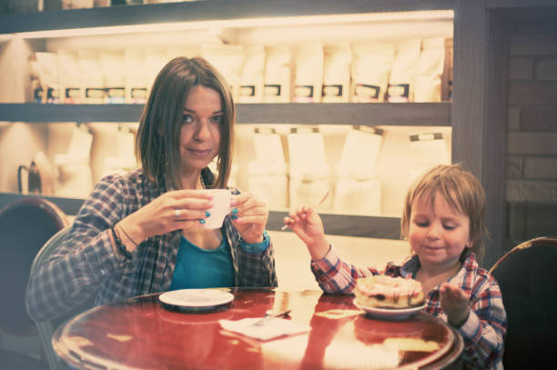 istock family in the cafe 684830120