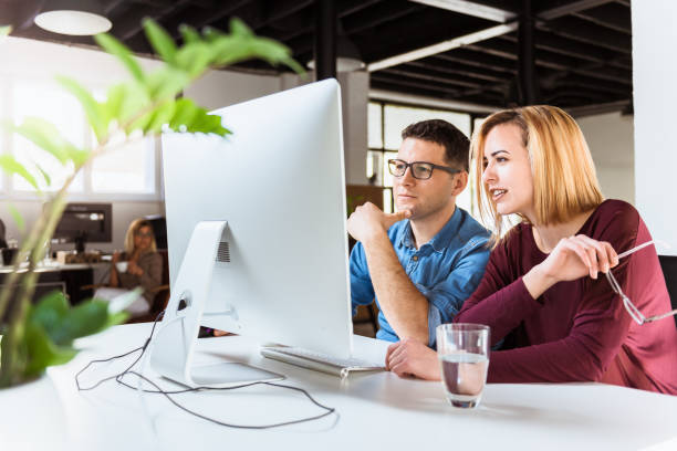 istock Young business people working in office 684830640