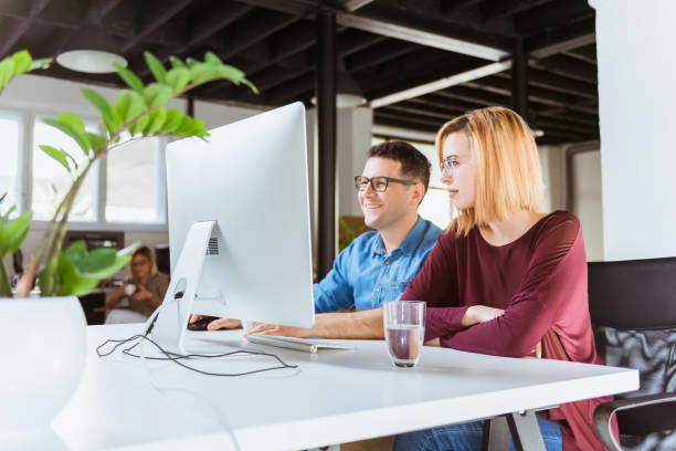 istock Young business people working in office 684833094