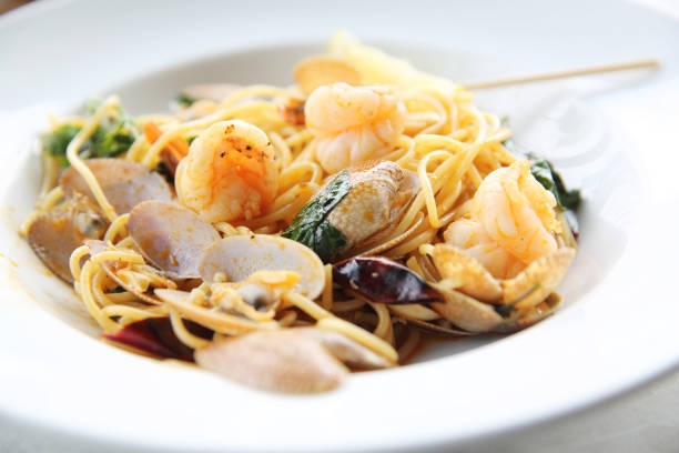 istock Seafood pasta Spaghetti with Clams, Prawns, Italian food 684833582