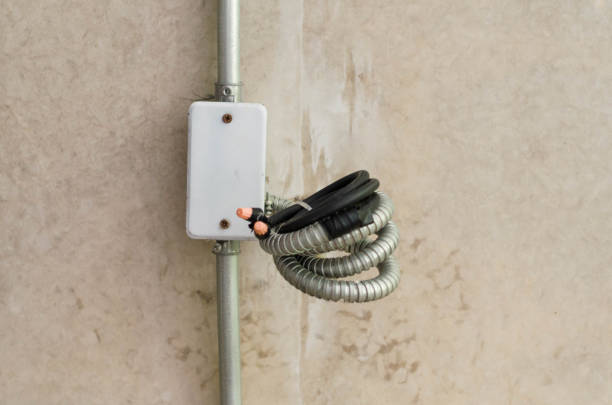istock Electric cable prepare for plug in at concrete wall. 684834488