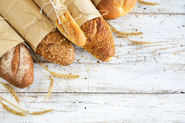 istock Freshly baked bread on wooden table 684841094