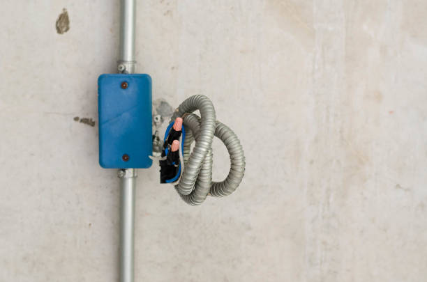 istock Electric cable prepare for plug in at concrete wall. 684841180