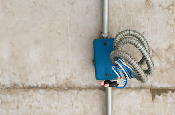 istock Electric cable prepare for plug in at concrete wall. 684841234