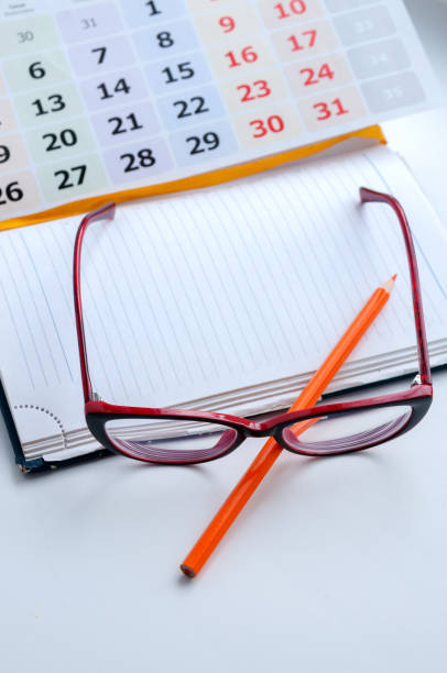 istock Business still-life, recording ideas, glasses, calendar and notes 684848606