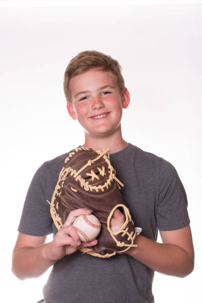 istock Boy with a Baseball Glove and Ball 684849068