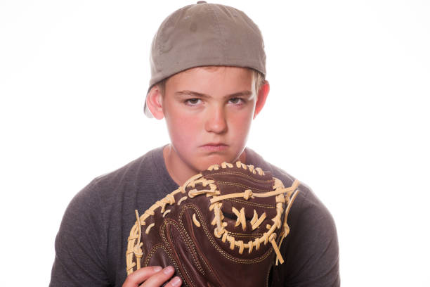 istock Sulky Boy with a Baseball Glove and Ball 684849090