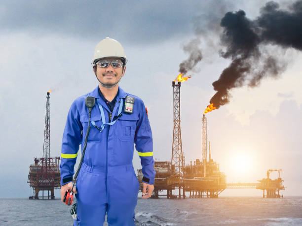 istock Working engineer at offshore oil and gas refinery 684876858