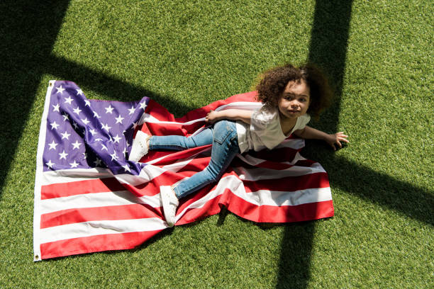 istock Cute girl with american flag 684886476