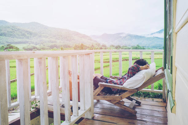 istock Young man relax on bed and enjoying on day 684897664